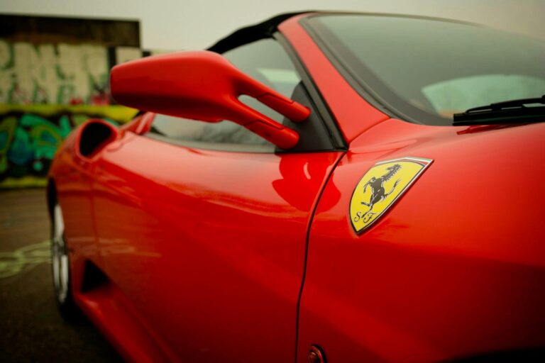 Which Car Brand Has A Prancing Horse As Its Logo?